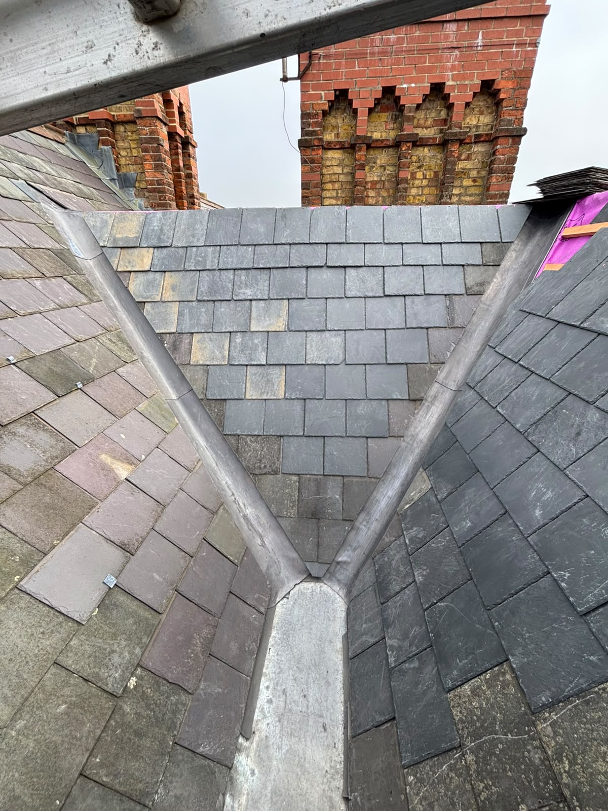 Hand-formed lead valley gutter between slate roof sections by White Horse Roofing, Oxfordshire